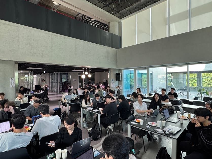 The Seoul AI Hub atrium full of builders at work