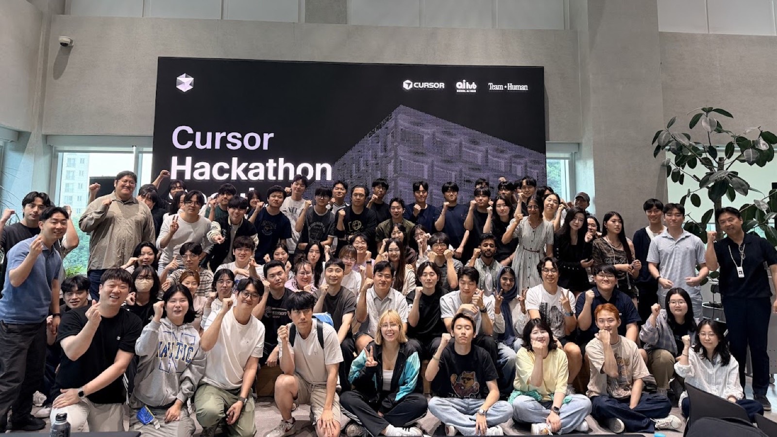 Everyone at Cursor Hackathon Seoul vol.3, in front of the LED wall at Seoul AI Hub